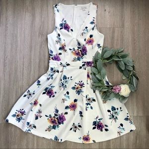 Francesca’s White Floral Plunge Neck Dress